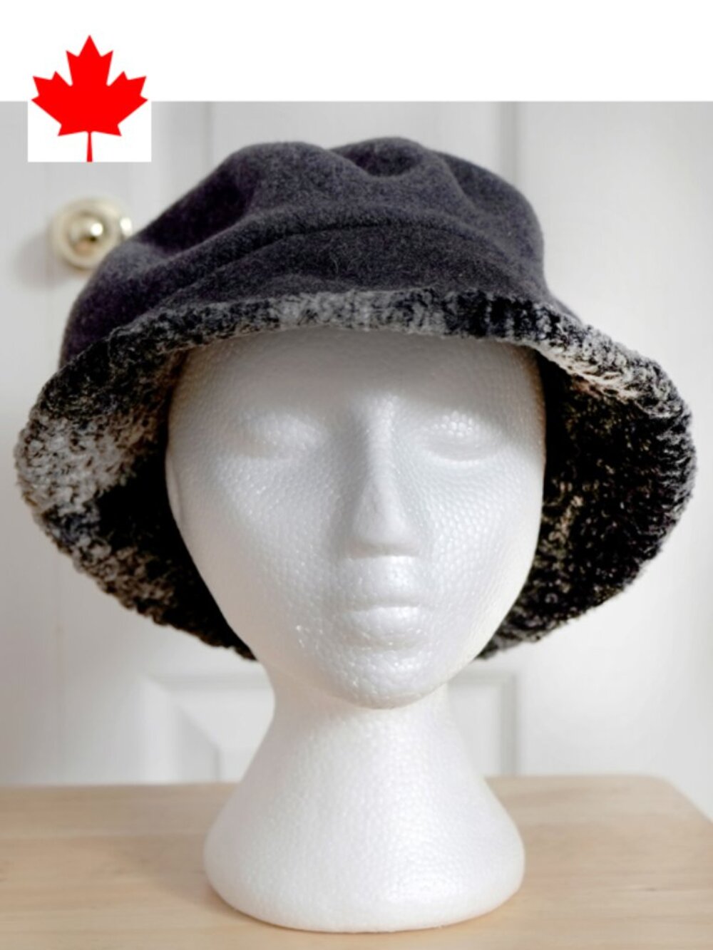 Grey Création Almar bucket hat with faux Persian lamb brim